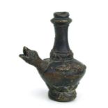 After the antique, a bronze water dropper in the form of a bird, 10cms high.
