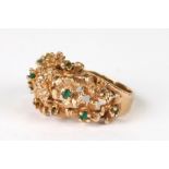 A 14ct gold mid 20th century design emerald set dress ring, total weight 7.9g, approx UK size 'N'.