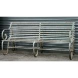 A large painted wrought iron garden bench, 183cms wide.Condition Reportpaint loss and rust but solid