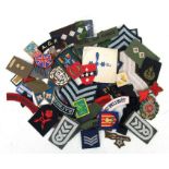 An assortment of approximately 75 mainly Military cloth badges