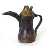 A Turkish / Islamic copper & brass dallah or coffee pot, 18cms high.