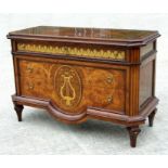 A French Empire style commode with single frieze drawer above two long drawers, 138cms wide.