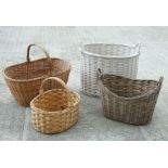 A wickerwork two-handled log basket, 58cms wide; together with three other baskets (4).