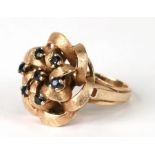 A 14ct gold mid-20th century design sapphire set dress ring, weight 7.9g, approx UK size 'L'.