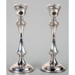 A pair of loaded silver candlesticks, Birmingham 1971, 20cms high (2).