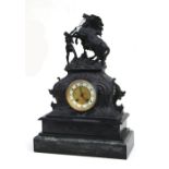 A Victorian spelter, slate and marble mantle clock, the white enamel dial with Arabic numerals,