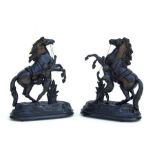 A pair of spelter Marley Horses on plinth bases, each 33cms ide (2).