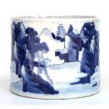 A Chinese blue & white cylindrical brush pot decorated with a mountainous landscape, 18cms