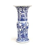 A Chinese blue & white Gu vase decorated with prunus, 46cms (a/f).Condition ReportThe vase has