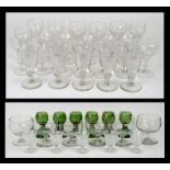 A quantity of assorted glassware to include a set of six green hock glasses, cordial glasses and