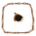 A 9ct rose gold pocket watch chain; together with a gold mounted bloodstone and carnelian in a