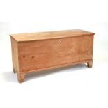A 19th century pine blanket box with internal candle box, 125cms wide.