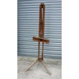 A Rowney pine artist's easel, 170cms high.