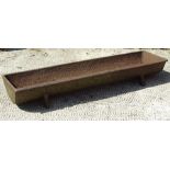 A cast iron pig trough, 85.75 by 20cms.