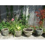 A group of four reconstituted stone garden planters (4).