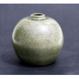 A Celadon crackle glazed jar of ovoid form, 15cms (6ins) high.