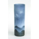 A French porcelain Studio vase of cylindrical form, decorated with a mountainous landscape, 29cms