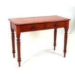 A Victorian mahogany side table with two frieze drawers, on turned legs, 99cms wide.