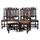 A set of six 16th century style oak dining chairs with carved back rails and splats, solid seat