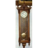 A large oak cased Vienna regulator wall clock, 11cms high.