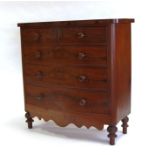 A Victorian figured mahogany bowfront chest of two short and three graduated long drawers, above a