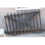 Three sections of heavy iron railings, each section 126cms long (3).