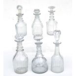 A group of six Georgian or later mallet shaped glass decanters and stoppers of varying size (6).