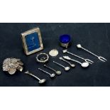 An Italian silver salt with blue glass liner; together with a silver photo frame, Sheffield 1992;