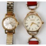 A Gucci 6000.2.L. ladies wristwatch, numbered '0278222'; together with a ladies Omega Deville