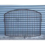 A rustic country house iron fire guard, 126cms wide.