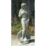 A reconstituted stone statue in the style of Venus de Milo, 120cms high.