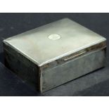 A large silver cigarette box, London 1944, with military presentation inscription to Lieutenant