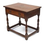 A 19th century George III style oak side table with single frieze drawer, on baluster turned legs