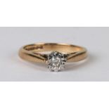 A 9ct gold diamond solitaire ring, approx UK size 'K'.