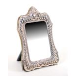 A silver strut photo frame, Sheffield 1989, overall 15 by 21cms.Condition ReportNo splits or repairs