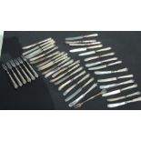 Thirty nine hallmarked silver handled knives & forks.