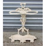 A Colebrookdale style painted cast iron stick stand, 45cms wide.