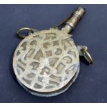 An Eastern brass pilgrim flask or powder flask, 22cms high.