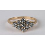 A 9ct gold blue topaz cluster ring, approx UK size 'Q'.Condition Reportgood overall condition no
