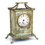 A carriage clock decorated with chinoiserie style panels in a faux gilt bamboo case, fitted with a