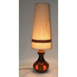 A 1970's West German pottery floor lamp with original shade, approx 130cms high.
