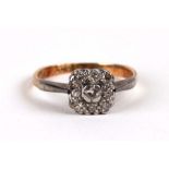 An 18ct gold and diamond cluster ring, weight 2.2g, approx UK size 'J'.