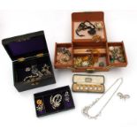 A quantity of assorted costume jewellery to include a set of six mother of pearl and enamel dress