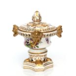 A 19th century Royal Crown Derby urn shaped pot pourri with gilt and floral decoration, 14cms high.