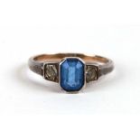 A 9ct gold dress ring set with blue & white stones, approx UK size 'K'.