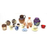 A Doulton stoneware harvest jug, a Crescent ware George Jones design ginger jar and cover;