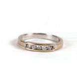 An 18ct white gold and diamond half-hoop ring, weight 3g, approx UK size 'L'.