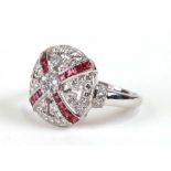 An 18ct white gold Art Deco style ruby and diamond cluster ring, approx UK size 'O'.