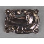 A Georg Jensen silver brooch in the form of a stylised bird, the reverse impressed 'Georg Jensen &