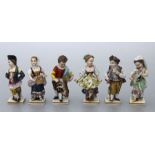 A group of six 19th century continental porcelain figures, each with gilt anchor mark, the largest